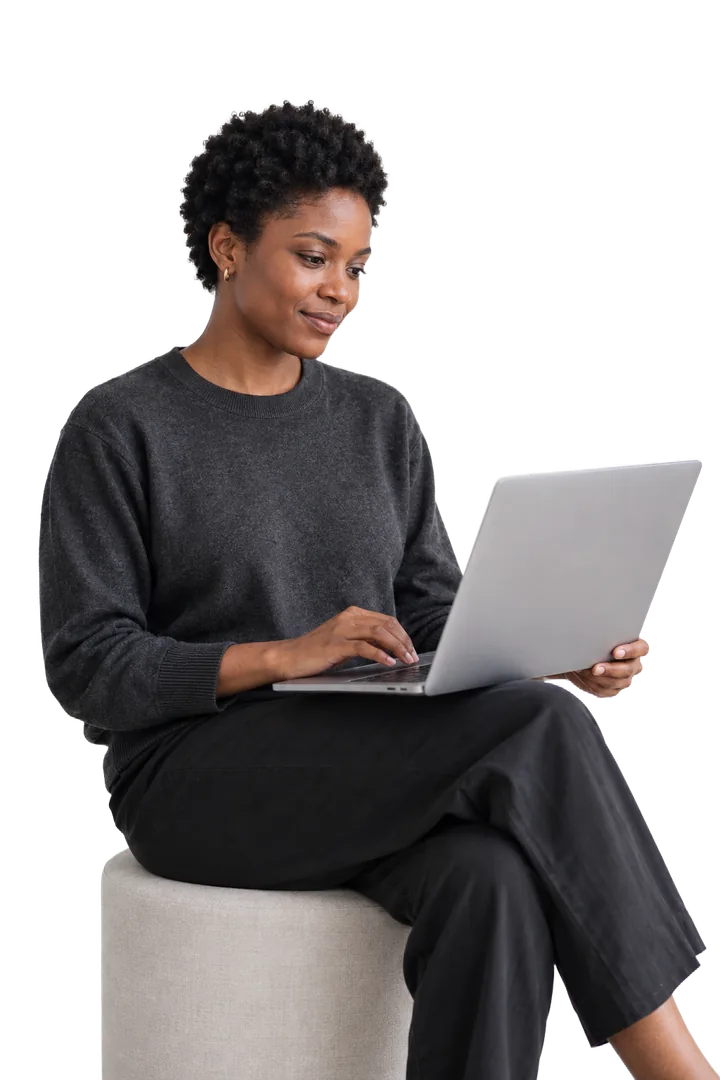 Woman working on a laptop (AI-generated image)